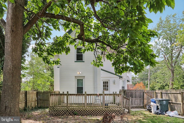 rear view of property with a deck