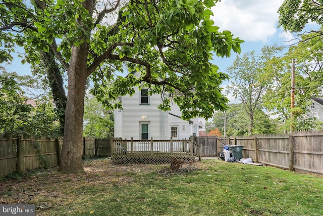 view of yard featuring a deck