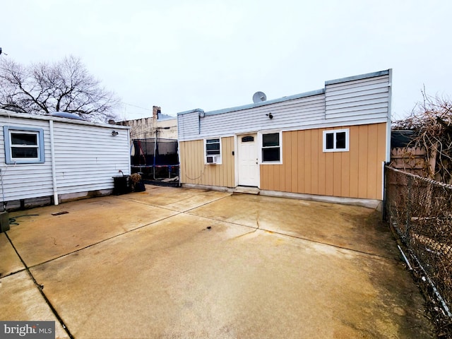 back of property featuring a patio area