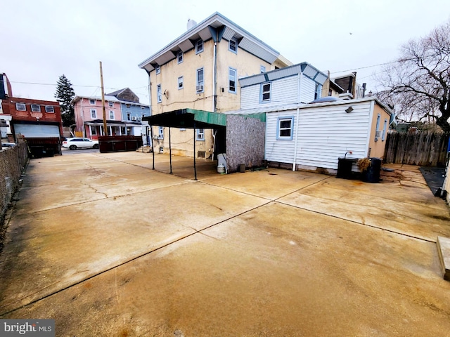 back of house with a garage