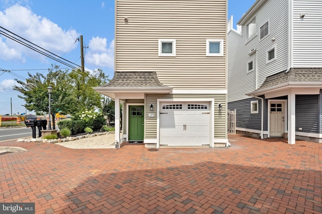 view of front of home featuring a garage