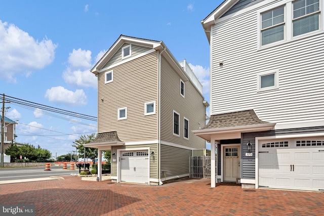 exterior space with a garage