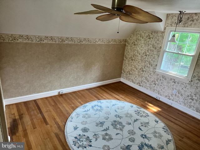 bonus room featuring ceiling fan and wood-type flooring