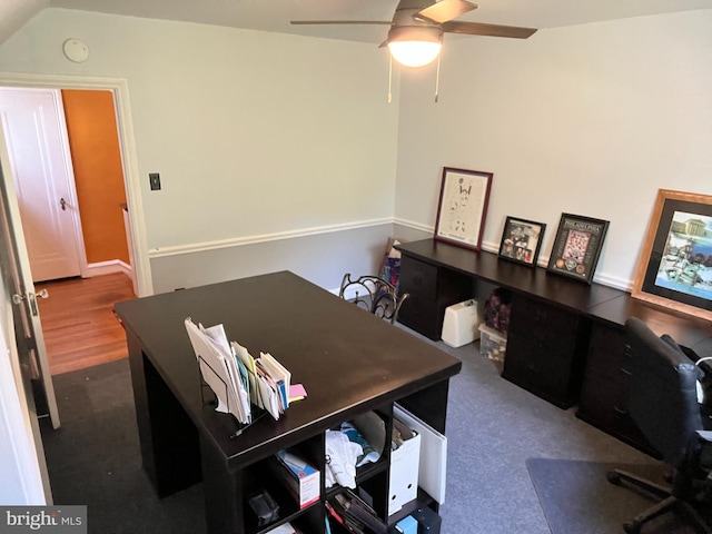 office space with hardwood / wood-style flooring, vaulted ceiling, and ceiling fan