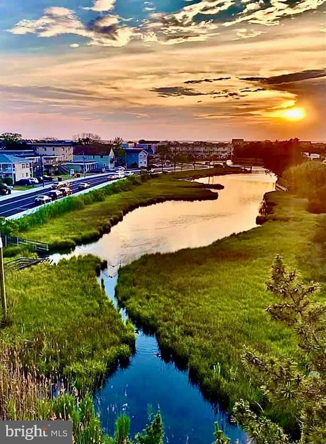 view of property's community featuring a water view