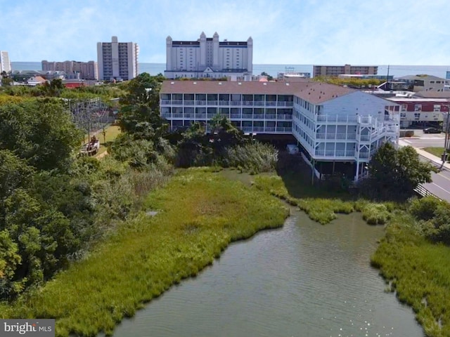 bird's eye view with a water view