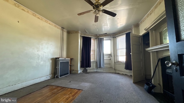 miscellaneous room featuring ceiling fan