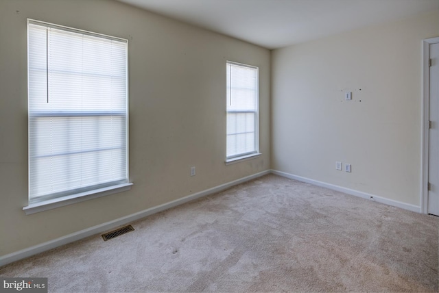 empty room with light carpet