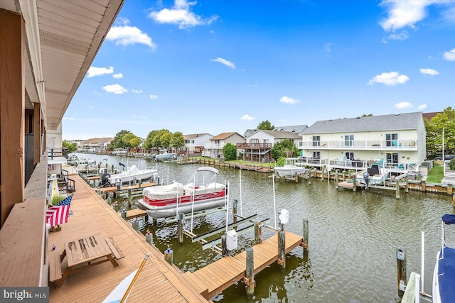 dock area with a water view