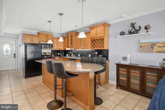 kitchen featuring pendant lighting, a kitchen bar, a center island, light tile patterned floors, and stainless steel appliances