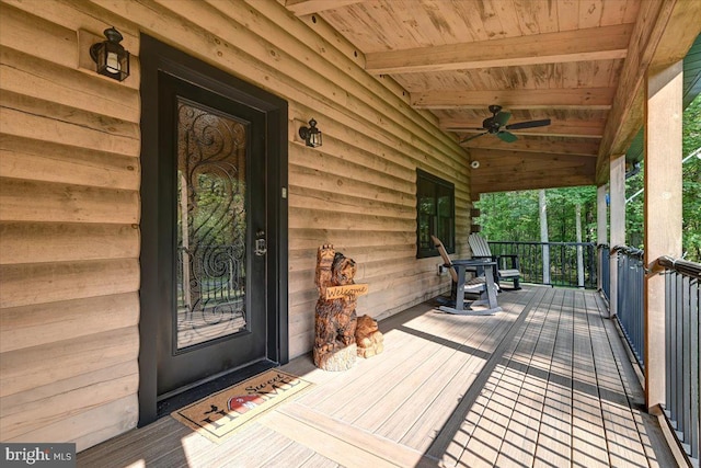 wooden deck with ceiling fan