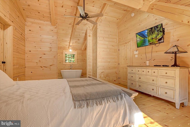 bedroom with lofted ceiling with beams, wooden walls, light hardwood / wood-style flooring, and wood ceiling