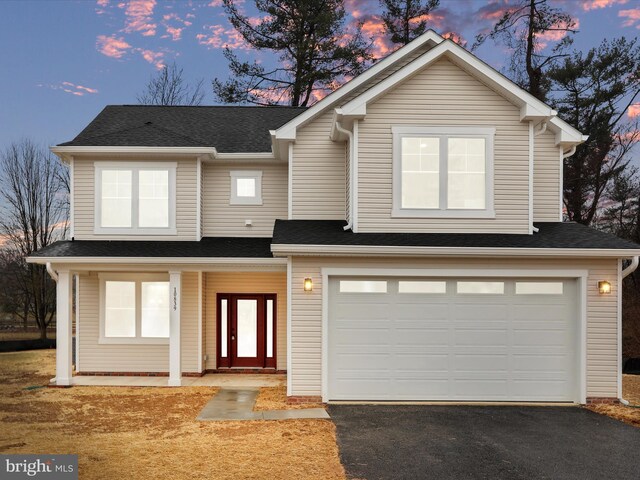 craftsman-style house featuring a porch and a front lawn