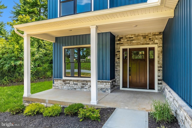 entrance to property with a porch