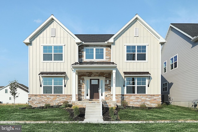 view of front of home with a front lawn