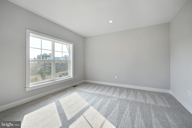 empty room with carpet floors