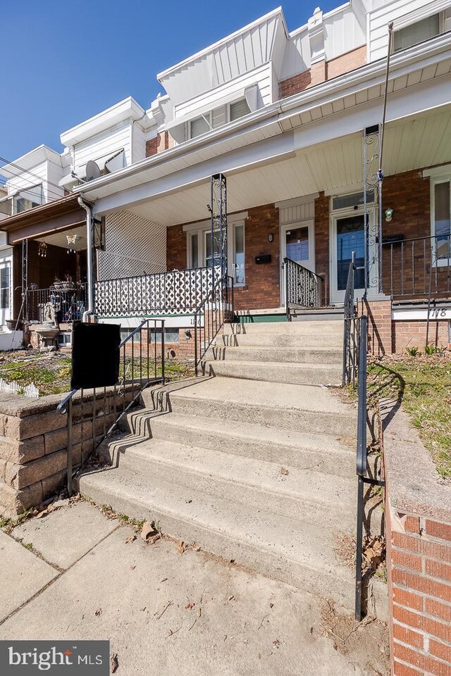 exterior space featuring covered porch