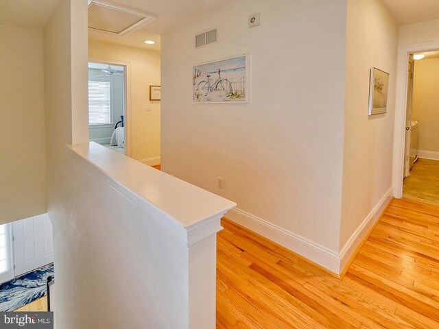 hallway featuring light hardwood / wood-style floors