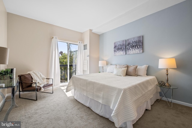 bedroom featuring access to outside, carpet flooring, and baseboards