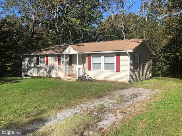 single story home with a front yard