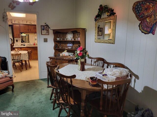 dining area featuring carpet floors