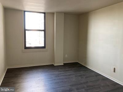 spare room with dark hardwood / wood-style flooring