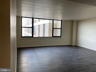 unfurnished room with dark hardwood / wood-style floors