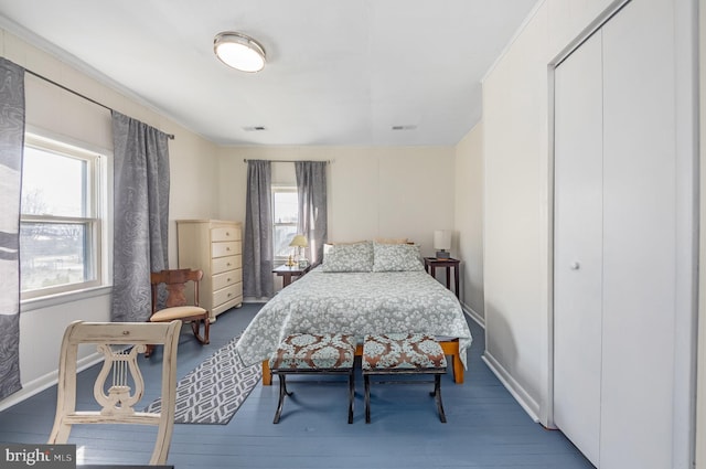 bedroom with wood-type flooring