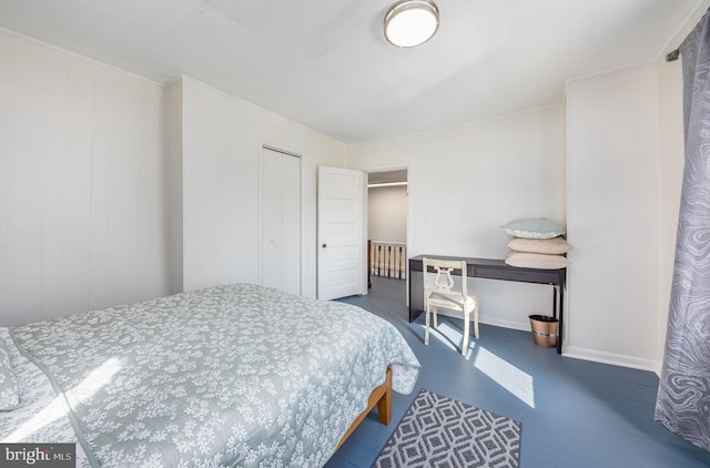 bedroom featuring a closet and wood-type flooring