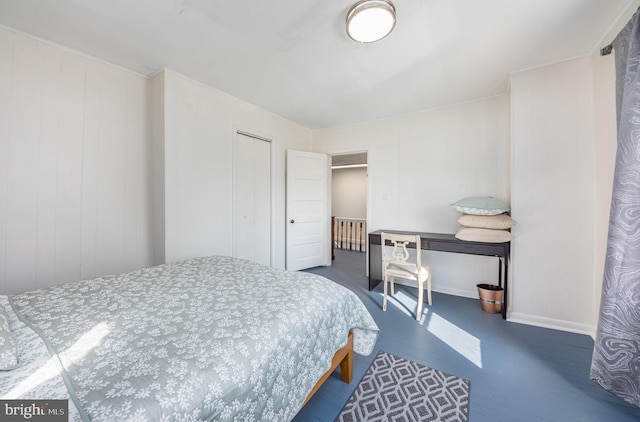 bedroom with hardwood / wood-style flooring