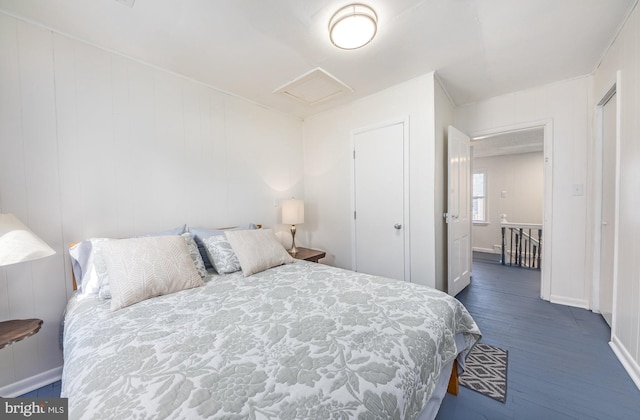 bedroom featuring dark hardwood / wood-style floors