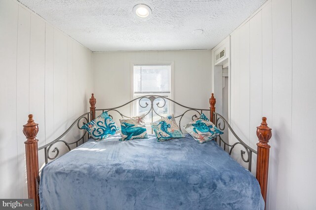 bedroom with a textured ceiling