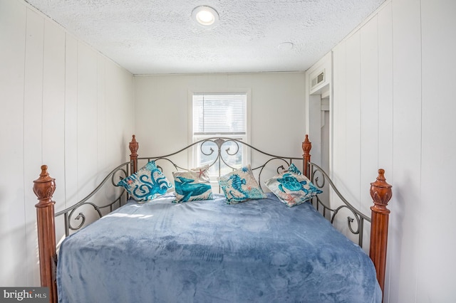 bedroom with a textured ceiling