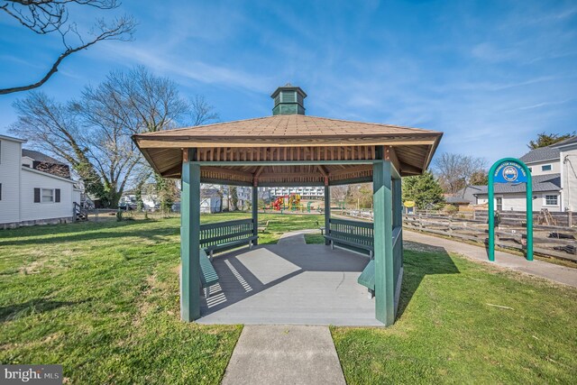 view of home's community featuring a lawn and a gazebo