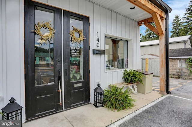 entrance to property with french doors and a patio