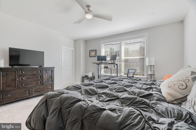 bedroom with ceiling fan and carpet flooring