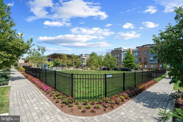 view of community featuring a lawn