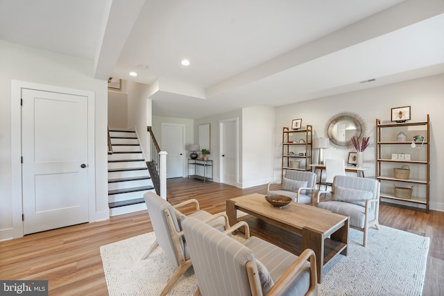 living room with light hardwood / wood-style floors