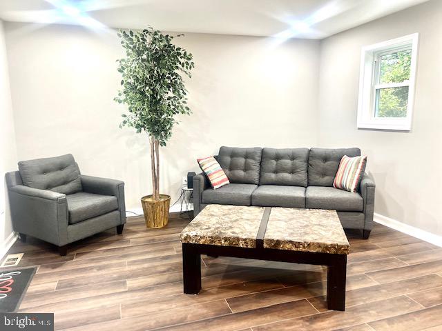 living room featuring hardwood / wood-style floors