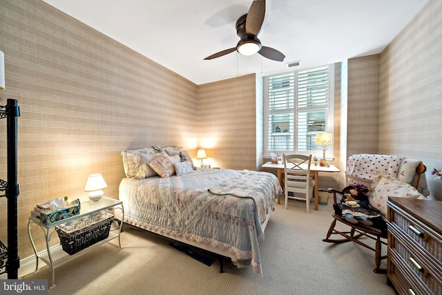 carpeted bedroom featuring ceiling fan