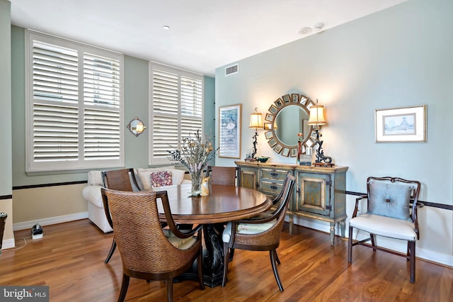 dining room featuring hardwood / wood-style flooring