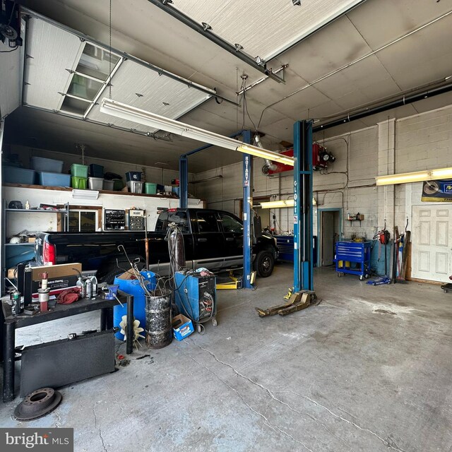 garage with a workshop area