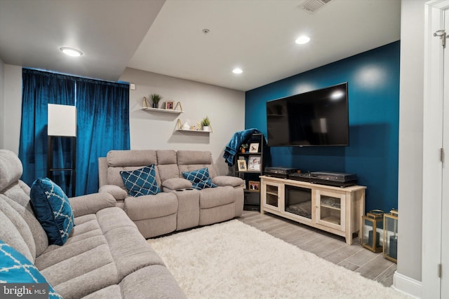 living room with hardwood / wood-style flooring