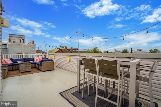 view of patio / terrace featuring an outdoor hangout area and a balcony