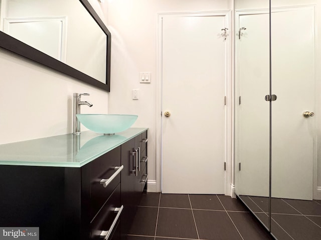 bathroom with vanity and tile patterned floors