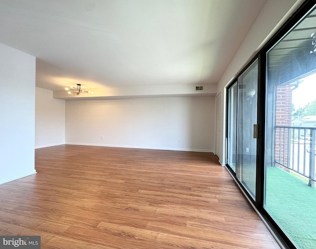 unfurnished room featuring light hardwood / wood-style flooring