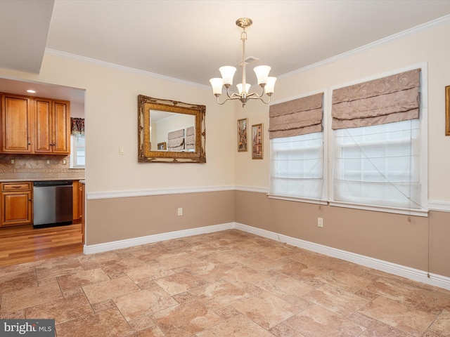 unfurnished dining area featuring a notable chandelier and ornamental molding