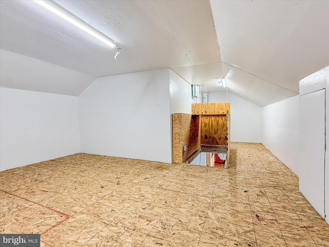 bonus room featuring lofted ceiling