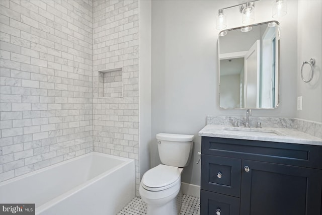 full bathroom with vanity, toilet, and tiled shower / bath combo