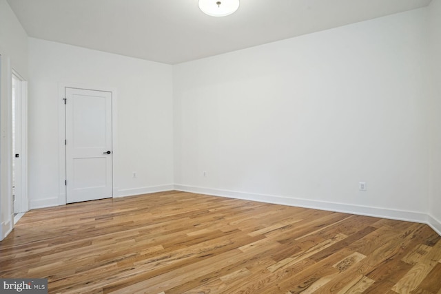 empty room with light wood-type flooring